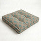 Patterned seat cushion on a white background
