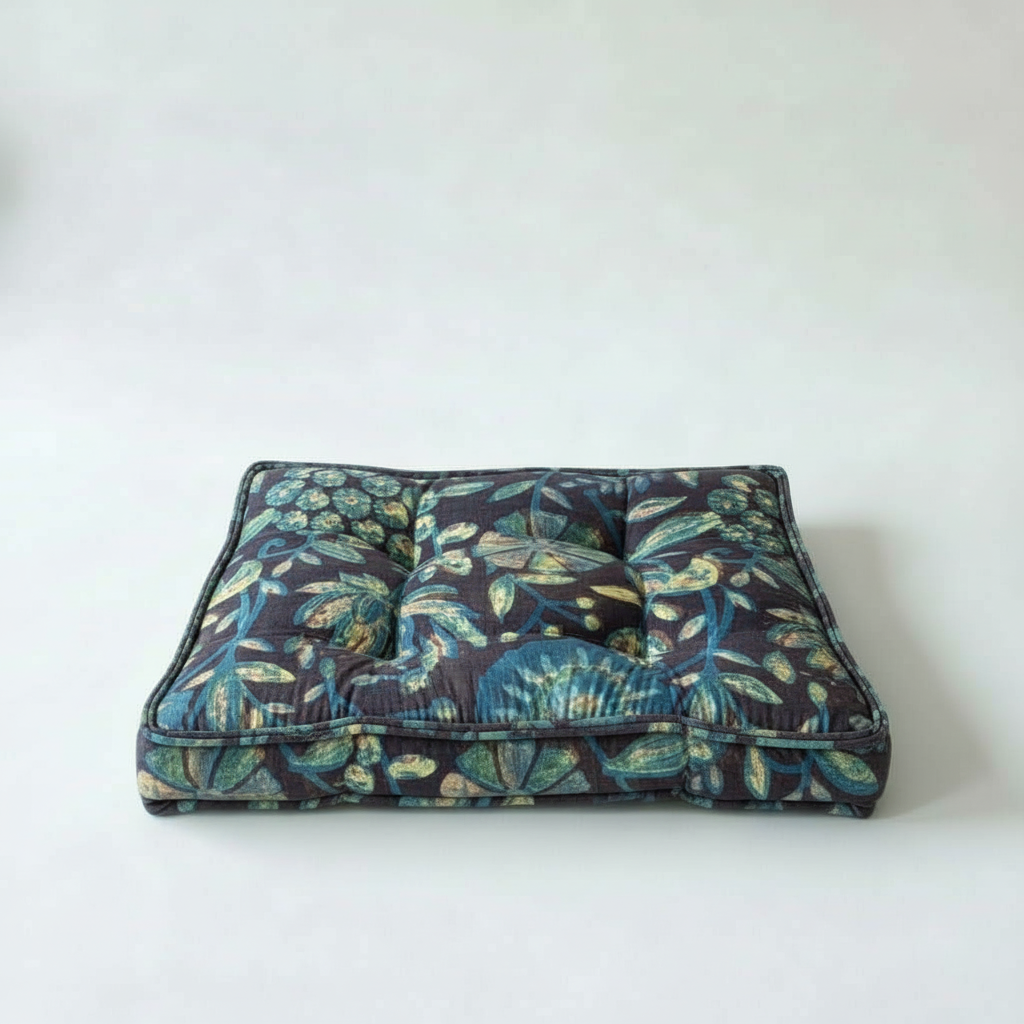 Floral-patterned pet bed on a white background