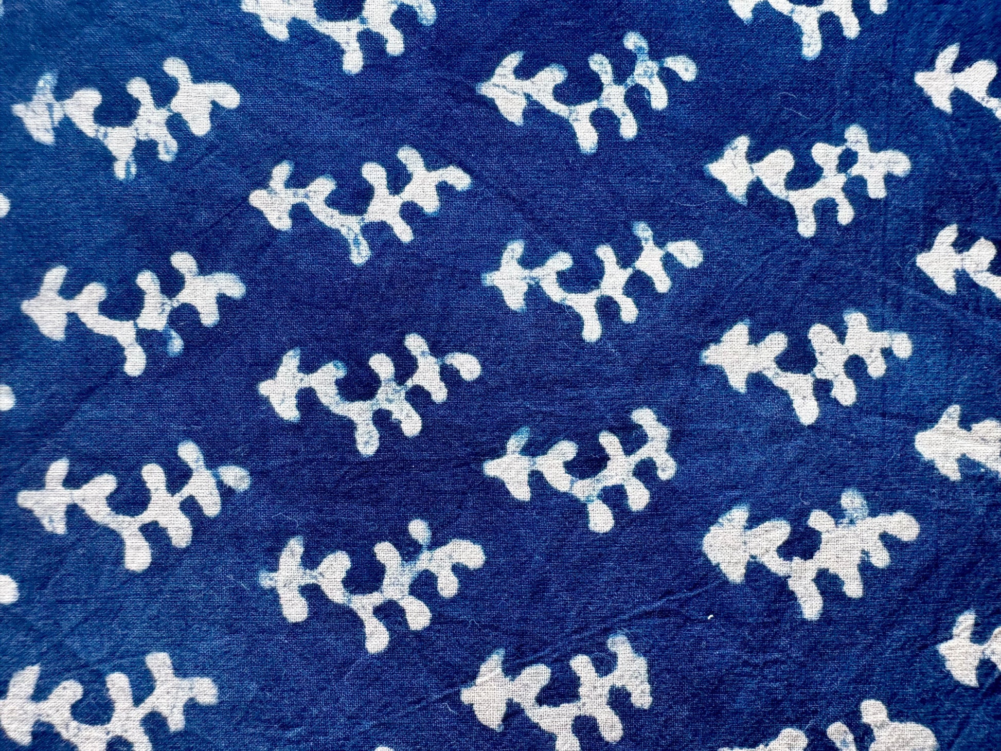 Blue fabric with white floral patterns