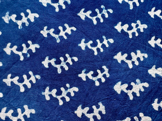 Blue fabric with white floral patterns