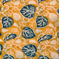 Fabric with blue leaf pattern on a yellow background