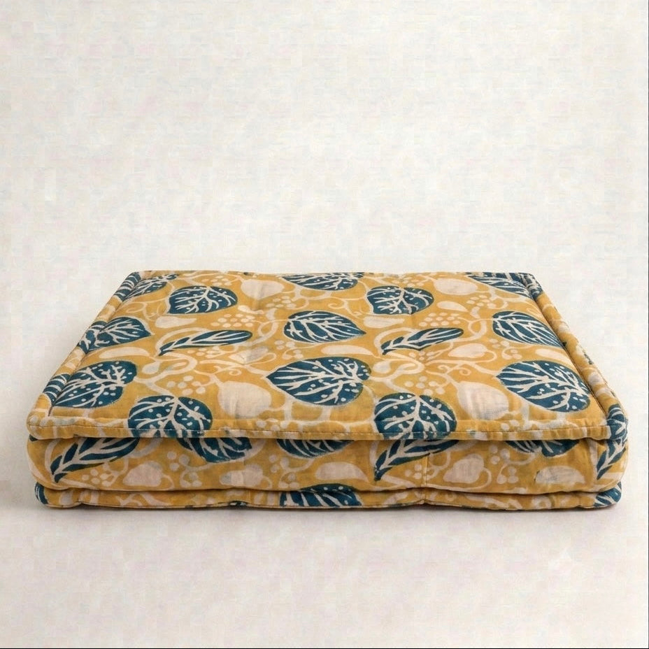 Floral-patterned blanket on a white background